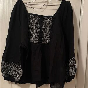 Elegant Black Blouse with White Embroidery
